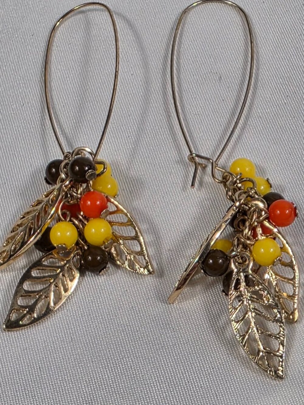 Nature-Inspired Dangle Earrings Gold Leaves Autumn Color Beads Kidney Style Wire